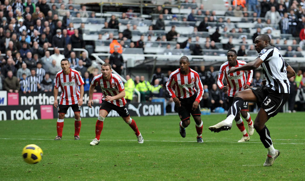 Shola Ameobi scores a penalty for Newcastle against Sunderland.