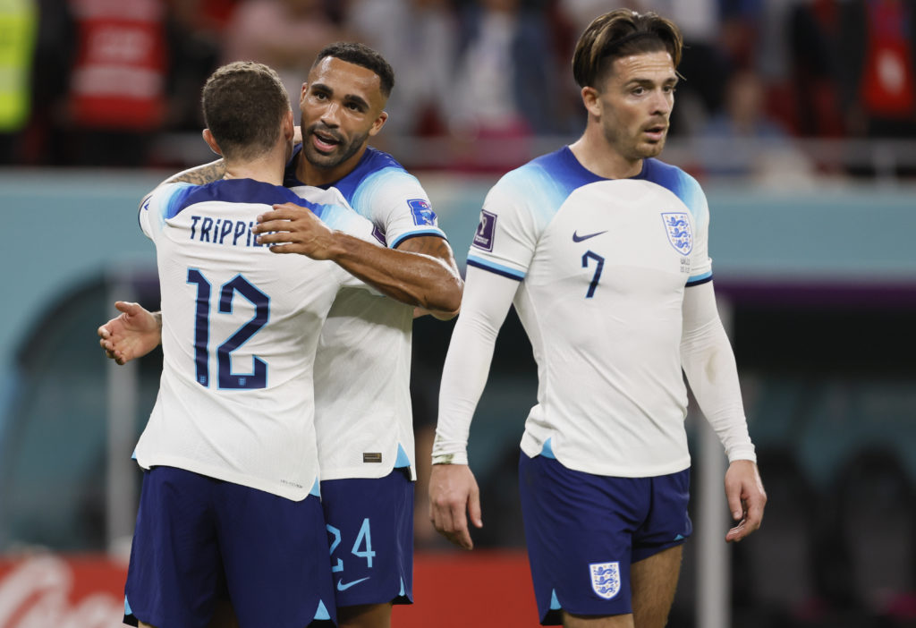 Kieran Tipper and Callum Wilson embrace, Jack Grealish in the foreground.
