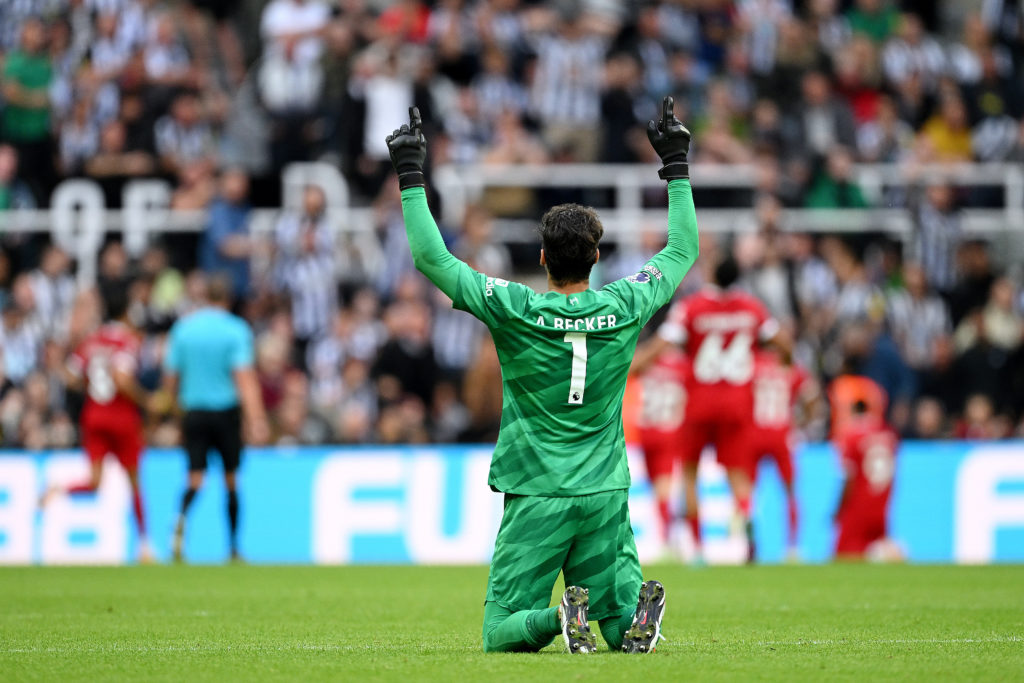 Alisson Becker celebrates after a goal in a Premier League game between Newcastle United and Liverpool.