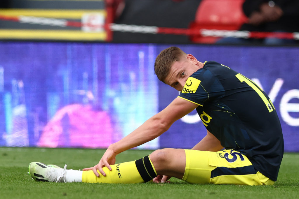 Newcastle United winger Harvey Barnes reacts after injury in Premier League at Sheffield United
