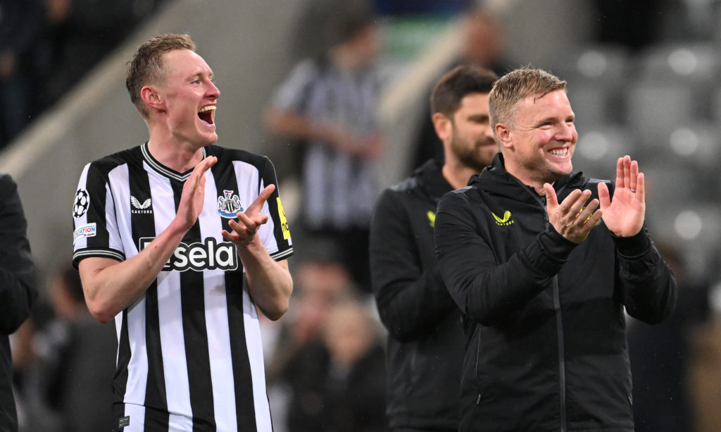 Eddie Howe and Sean Longstaff applaud the Newcastle United fans after their historic 4-1 against PSG.