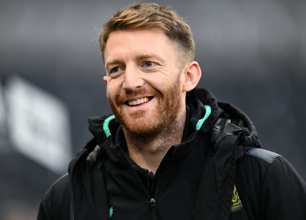 Close up image of Mark Gillespie smiling.