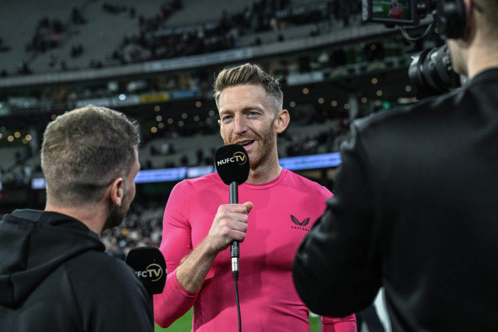 Mark Gillespie is interviewed after Newcastle United's win against Tottenham Hotspur in Melbourne.