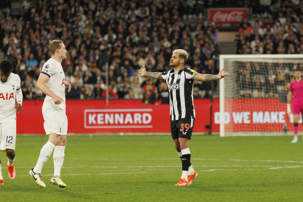 Bruno Guimarães of Newcastle United FC (R) appeals to the