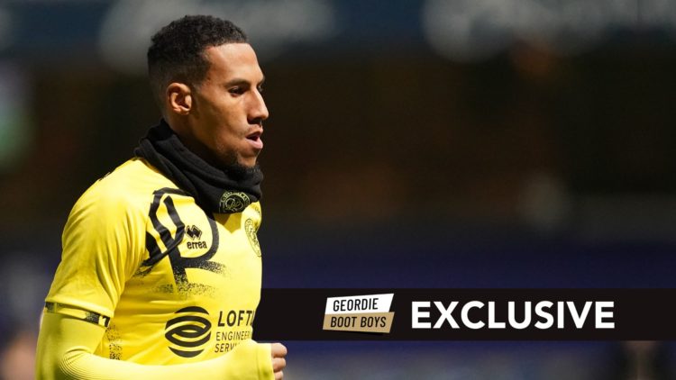 Isaac Hayden of Queens Park Rangers warming up prior to the Sky Bet Championship match. Overlaid, an exclusive banner.