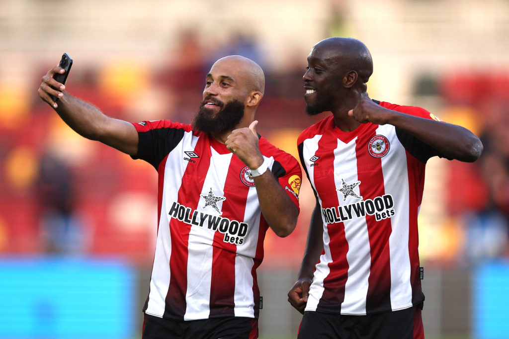 Bryan Mbeumo and Yoane Wissa take a selfie during a Premier League game between Brentford and Ipswich Town.