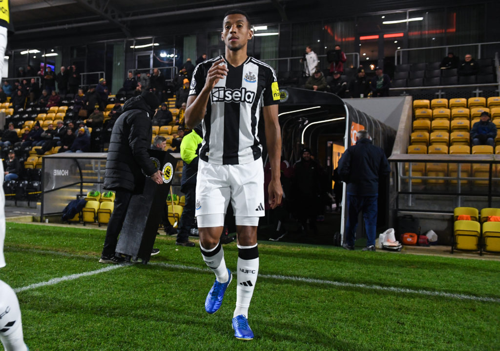 Isaac Hayden celebrates with teammates after a goal in a National League Cup game between Boston United and Newcastle United.