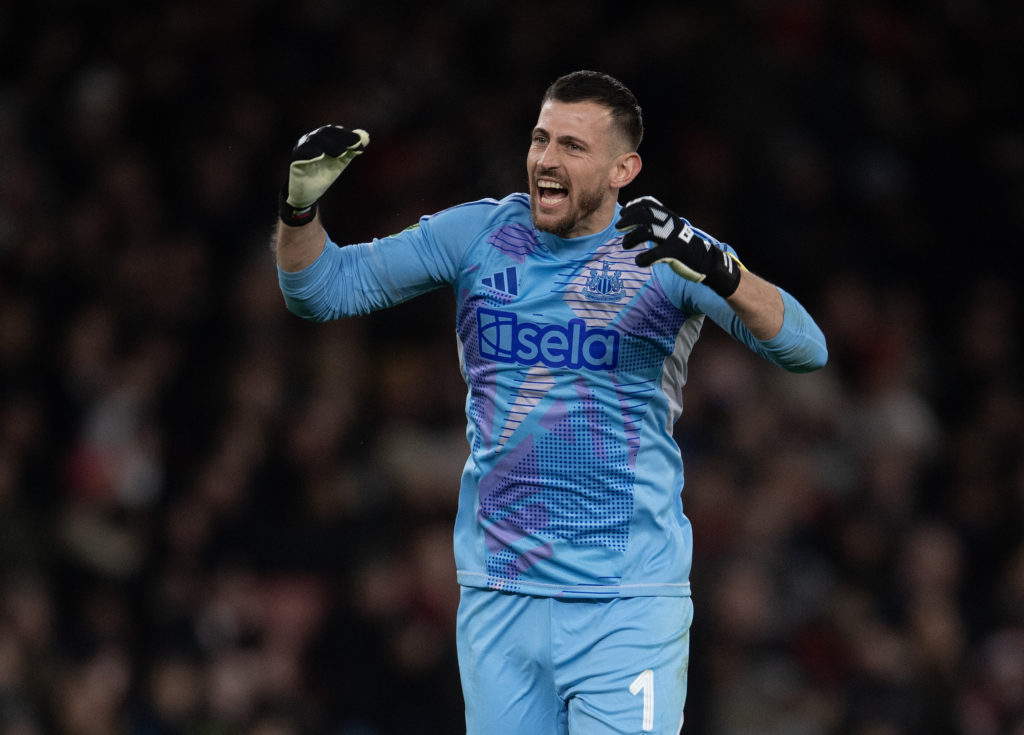 Martin Dubravka celebrates a Newcastle United goal against Arsenal in the Carabao Cup.