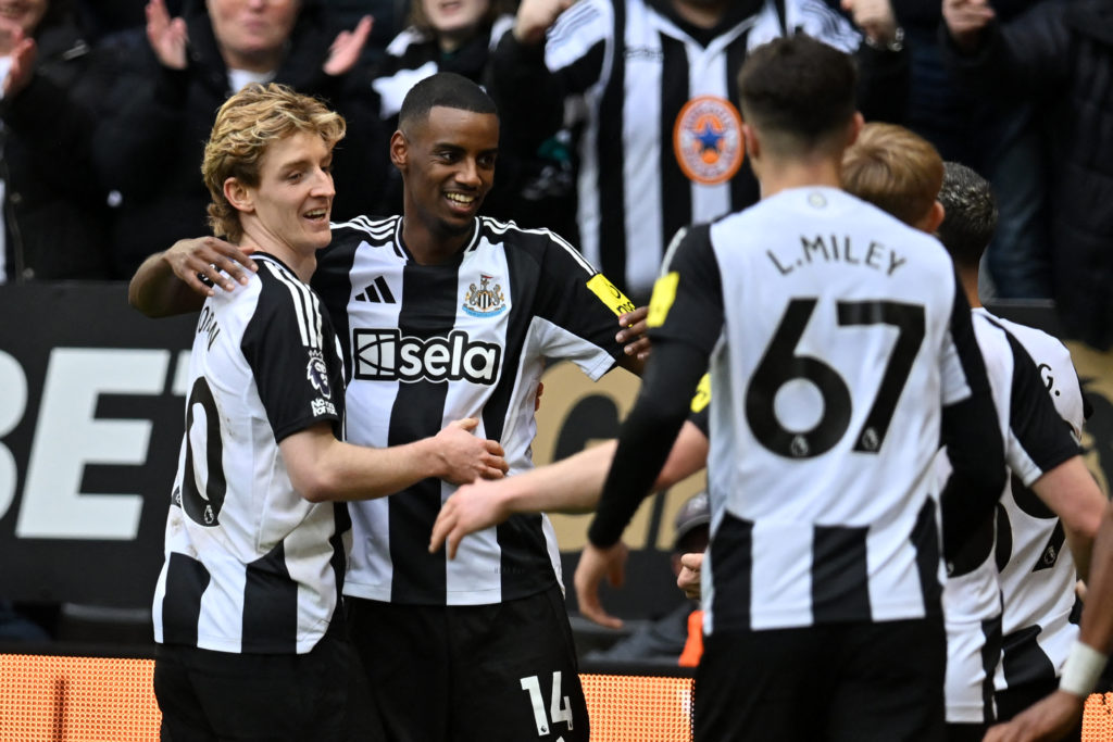 Alexander Isak celebrates scoring against Nottingham Forest with Anthony Gordon.