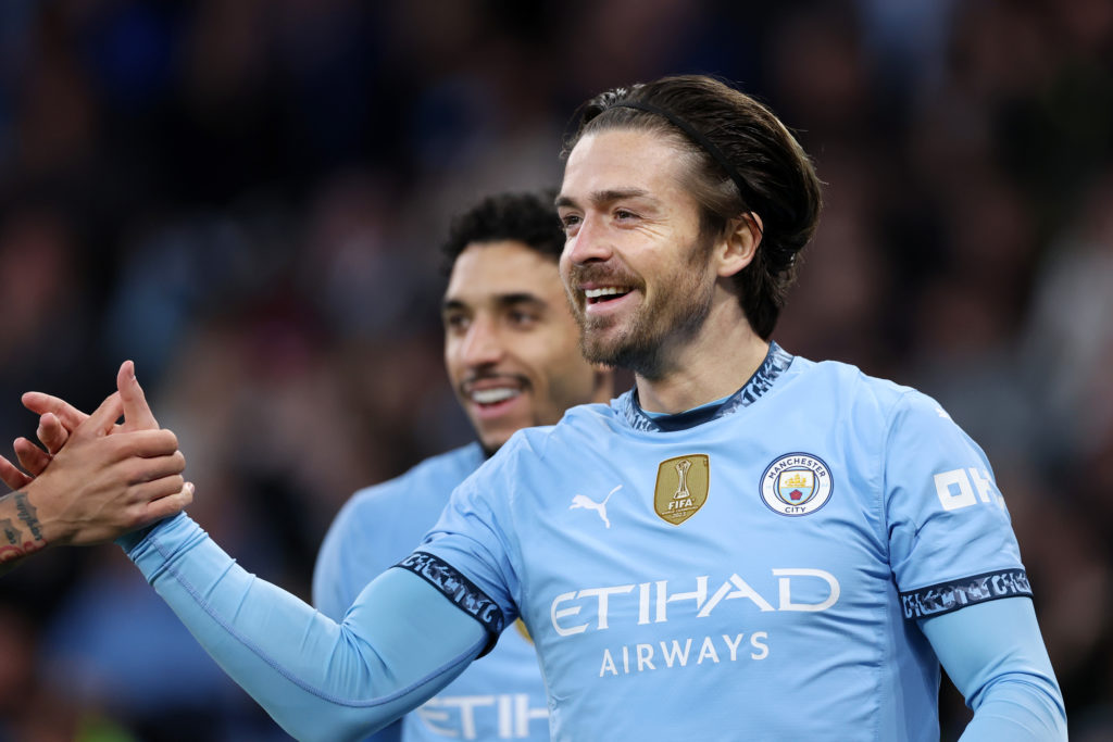 Jack Grealish of Manchester City celebrates scoring his team's first goal during the Premier League match between Manchester City FC and Leicester City FC