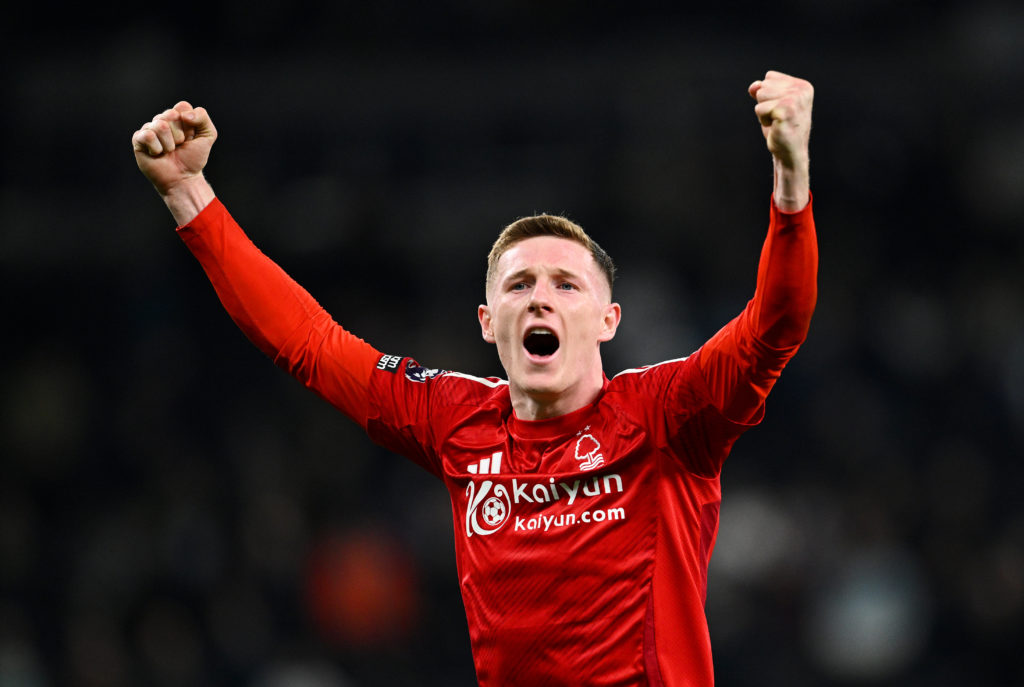 Elliot Anderson holds his fists in the air in celebration during Nottingham Forest and Tottenham.
