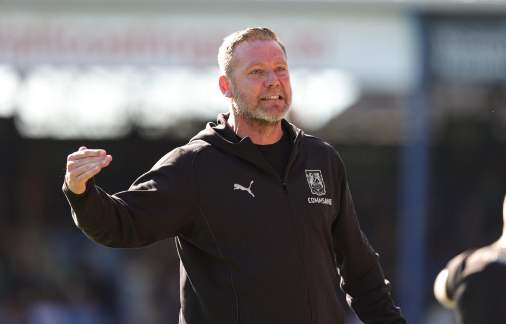 Kevin Noland celebrating after Northampton score against Peterborough.