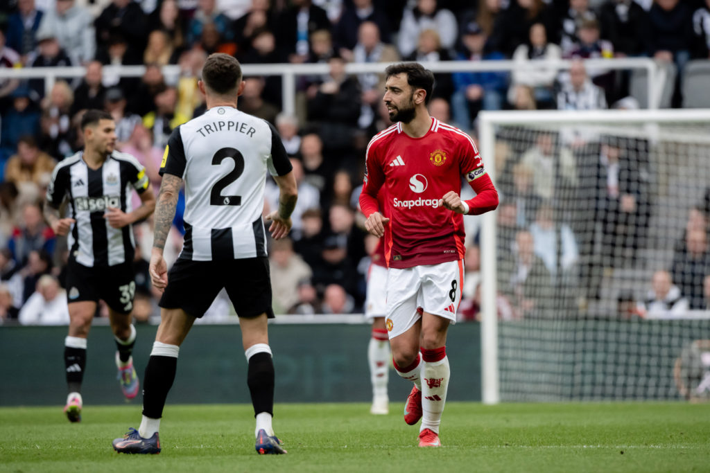 Bruno Fernandes runs past Kieran Trippier during Newcastle United vs Manchester United at St James' Park.