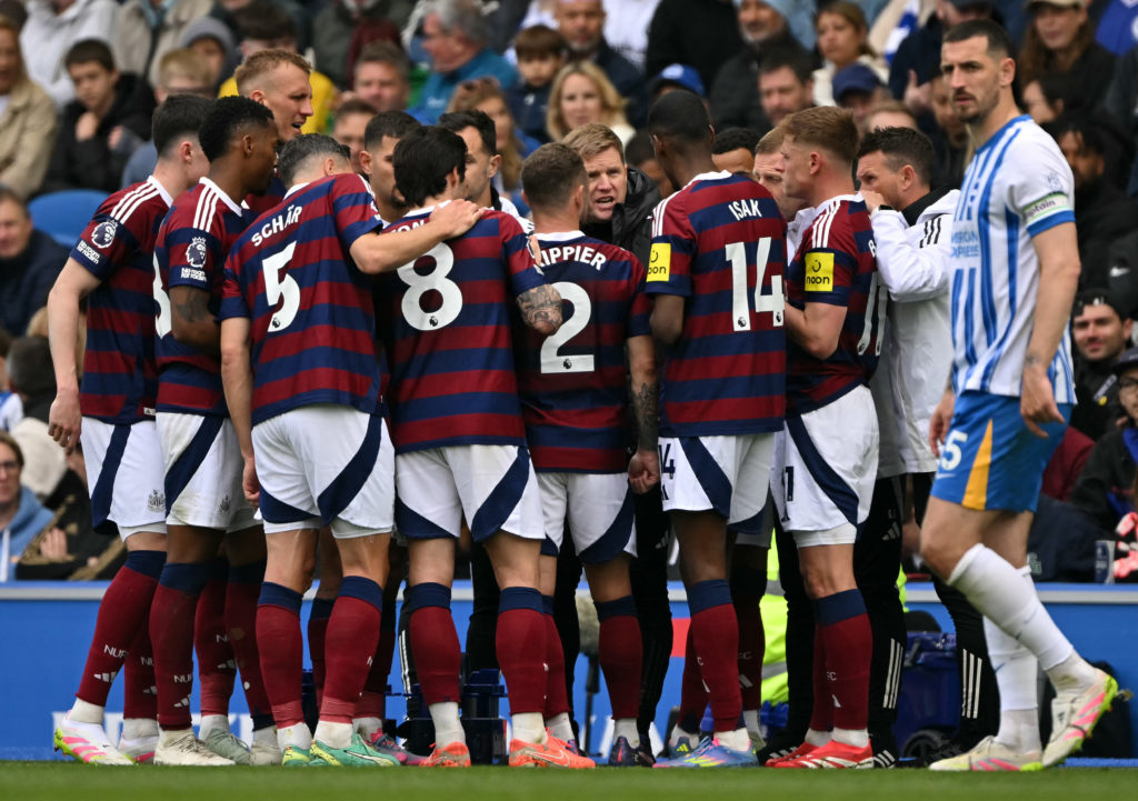 Eddie Howe speaks to his players during Newcastle United's Premier League game against Brighton.