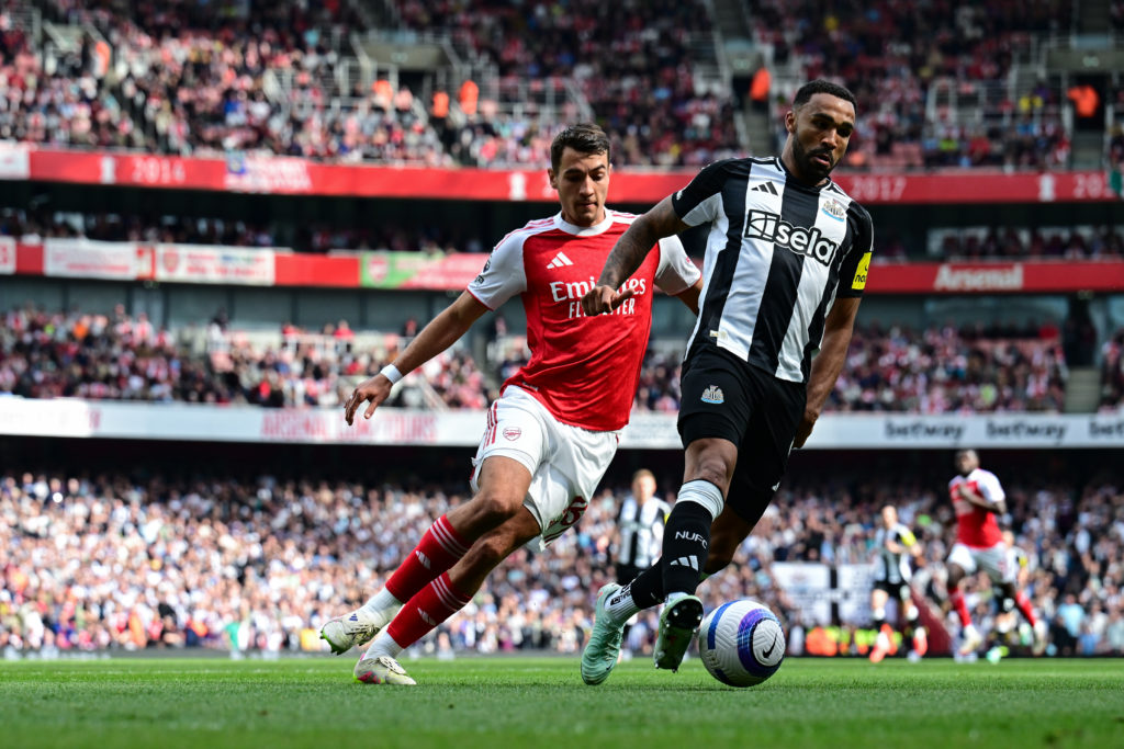 Newcastle United striker Callum Wilson runs with the ball against Arsenal at the Emirates Stadium.
