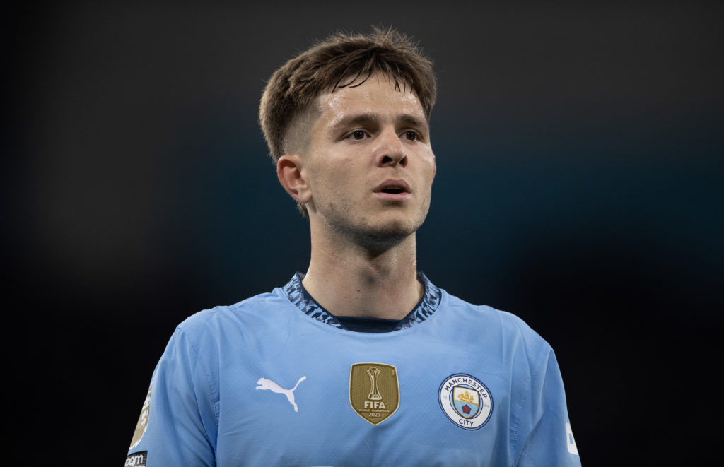 James McAtee looks on while playing for Manchester City.