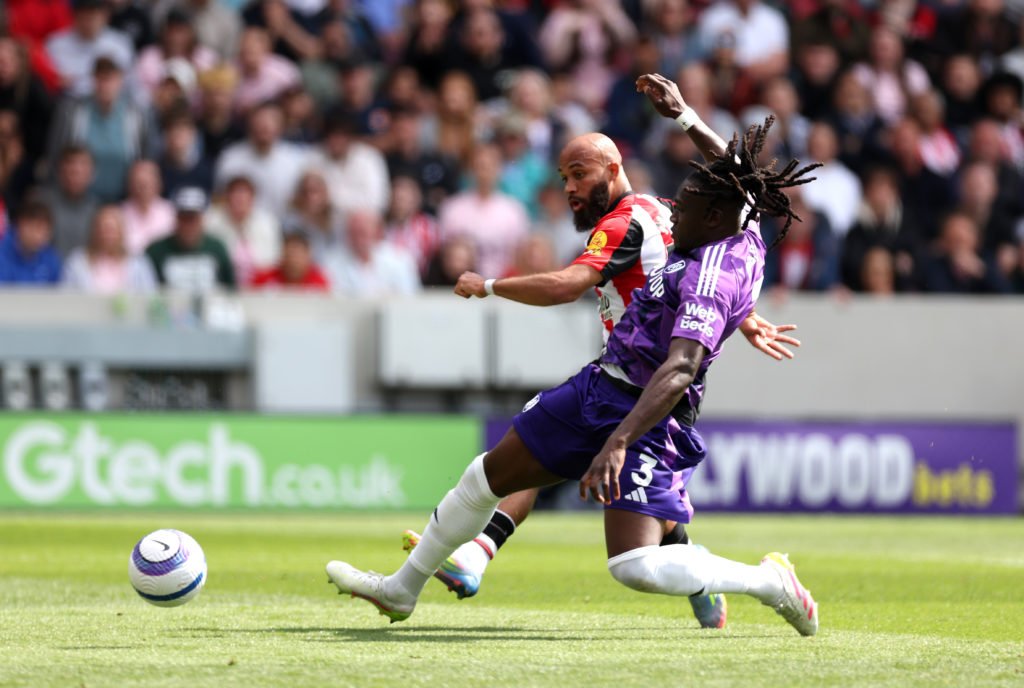 Bryan Mbeumo scores for Brentford in a Premier League game against Fulham.