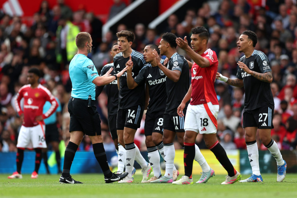 Aston Villa players react after Morgan Rogers has a goal ruled out against Manchester United.
