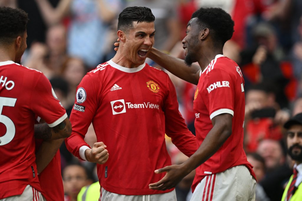 Cristiano Ronaldo and Anthony Elanga celebrate a goal for Manchester United.