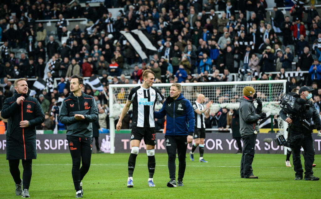 Dan Burn speaks to Eddie Howe after making his Newcastle United debut in a Premier League win over Aston Villa.