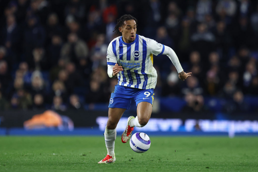 Brighton attacker Joao Pedro runs with the ball against Bournemouth.