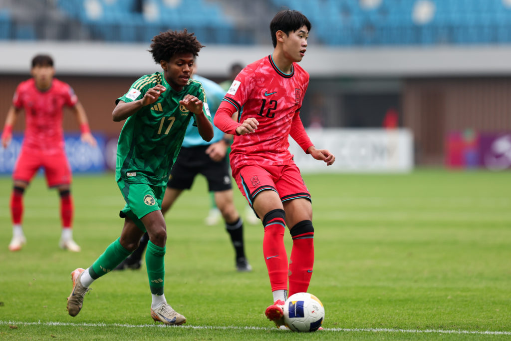 Park Seung-soo holds the ball up during a game between Saudi Arabia and South Korea U20s.