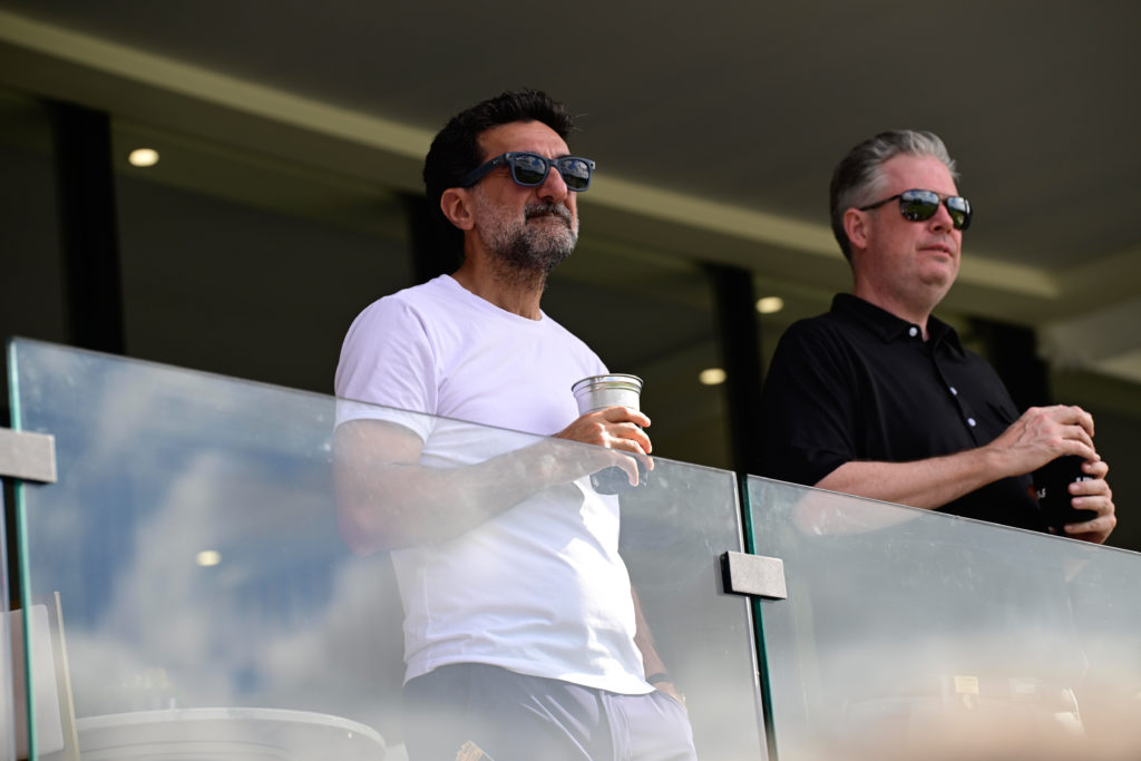 Newcastle United chairman Yasir Al-Rumayyan watches a LIV Golf event.
