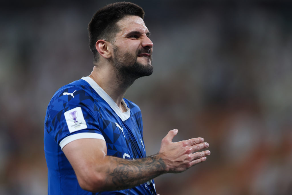 Aleksandar Mitrovic celebrates scoring a goal for Al Hilal.