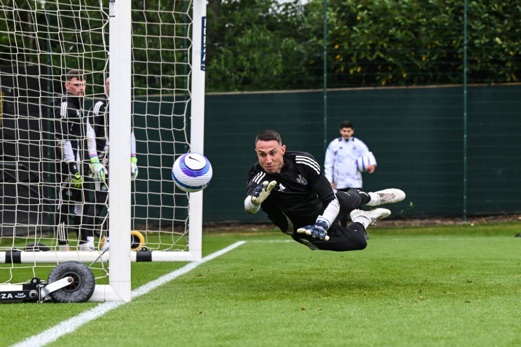 Odysseas Vlachodimos dives fro the ball during a Newcastle United Training Session