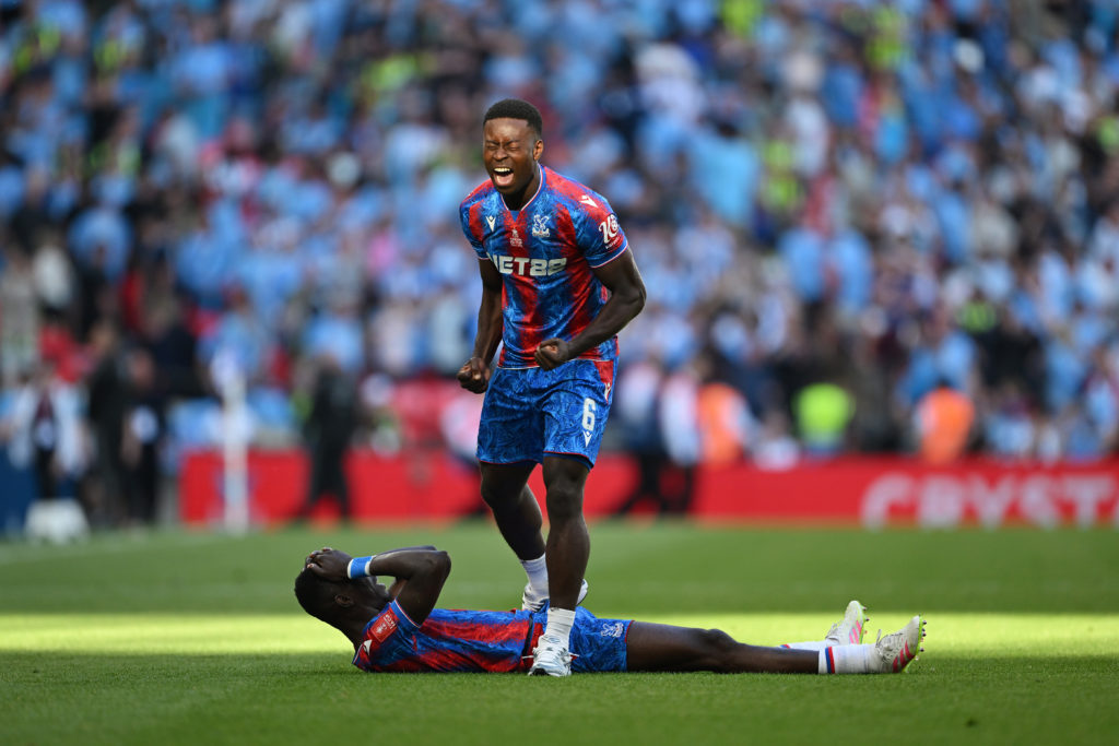 Marc Guehi celebrates after Crystal Palace beat Manchester City in the FA Cup final at Wembley.