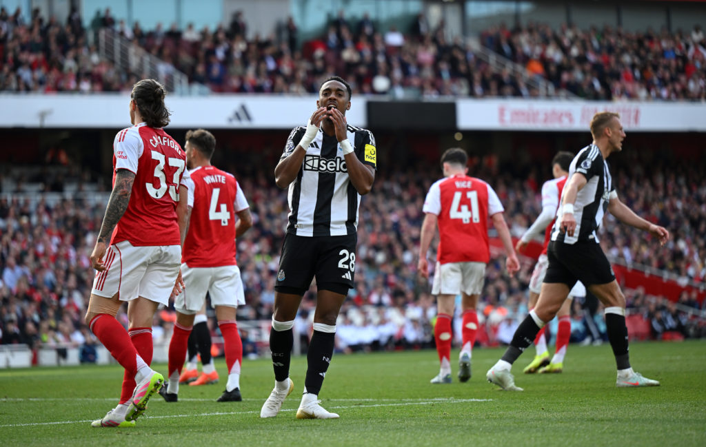 Joe Willock reacts after missing a chance during Newcastle United's Premier League game against Arsenal.