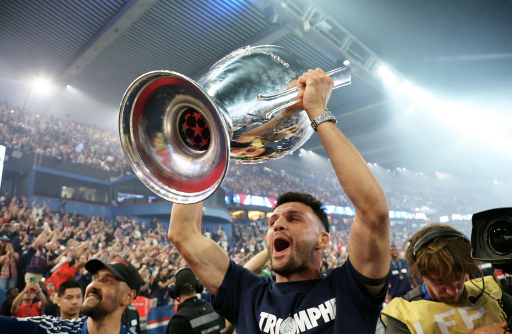 Goncalo Ramos celebrates with the Champions League trophy after Paris Saint-Germain beat Inter Milan in the final at the Allianz Arena.