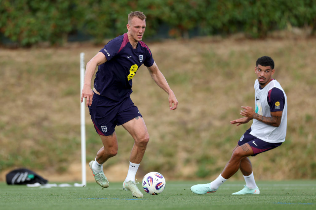 Dan Burn running with the ball during an England training session.