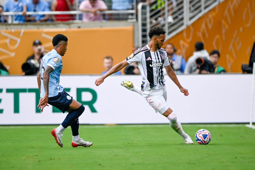 Lloyd Kelly strikes the ball during a Club World Cup game between Juventus and Manchester City.