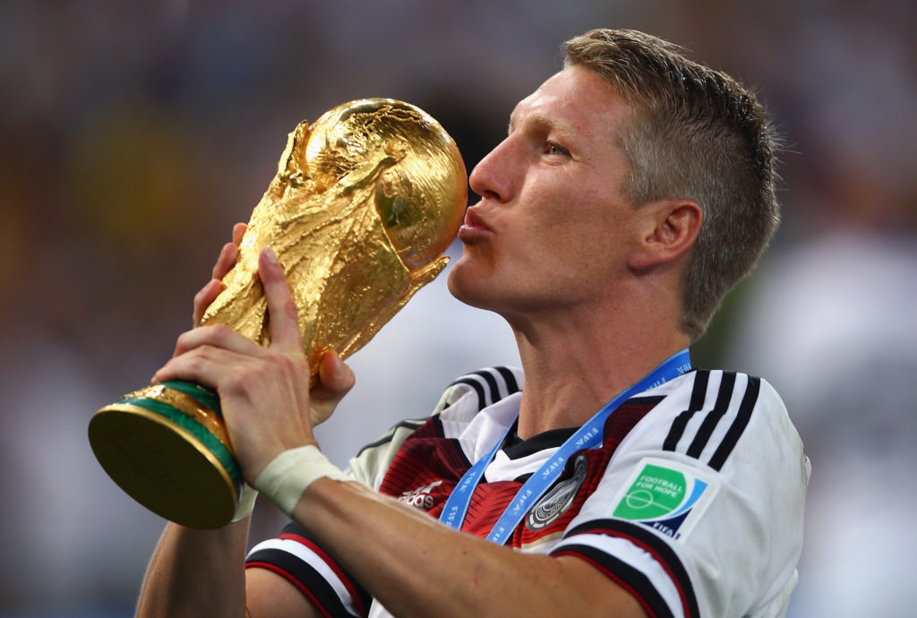 Bastian Schweinsteiger lifts the World Cup trophy in 2014.