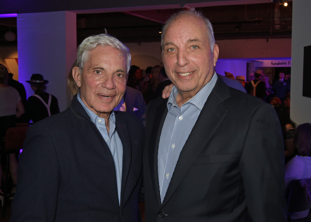 Newcastle United co-owners Simon and David Reuben pose for a photo at the Lyric Hammersmith theatre.
