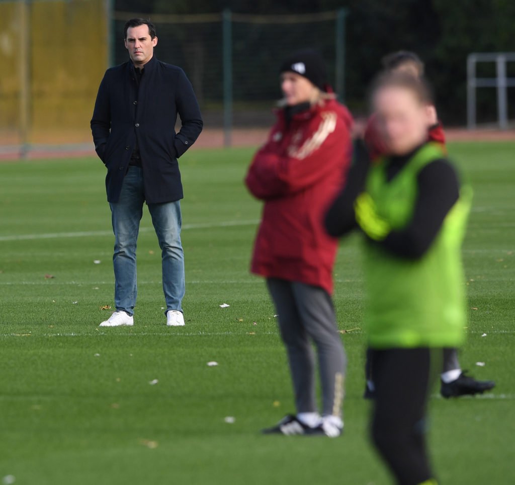 Jason Ayto watches Arsenal Women train.
