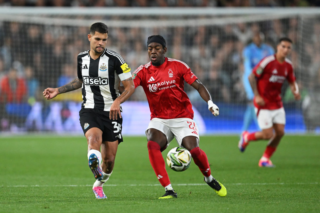 Bruno Guimaraes and Anthony Elanga battle for the ball during a Carabao Cup game between Notingham Forest and Newcastle United.
