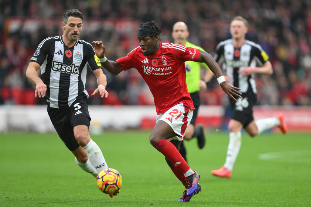 Anthony Elanga runs past Fabian Schar with the ball during Nottingham Forest vs Newcastle United.