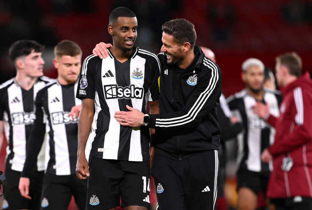 Alexander Isak and Jason Tindall celebrate after Newcastle United's win over Manchester United.