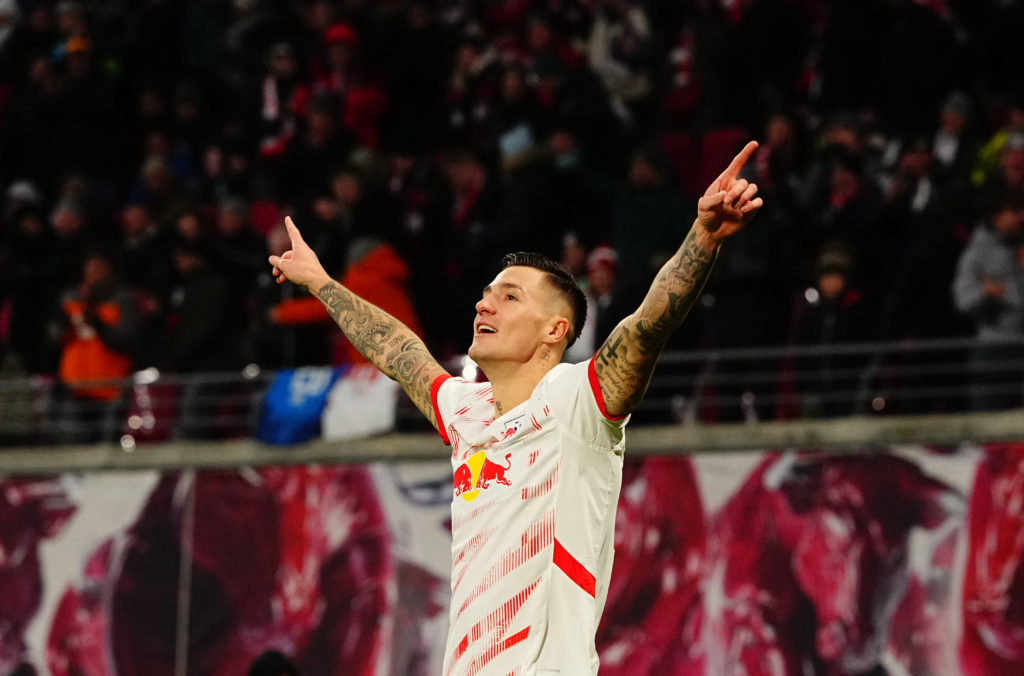 Benjamin Sesko celebrates scoring a goal for RB Leipzig against Werder Bremen in the Bundesliga.