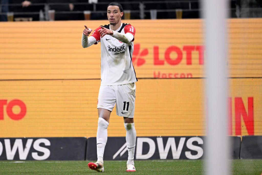Hugo Ekitike celebrates after scoring in a Bundesliga game between Eintracht Frankfurt and Borussia Dortmund