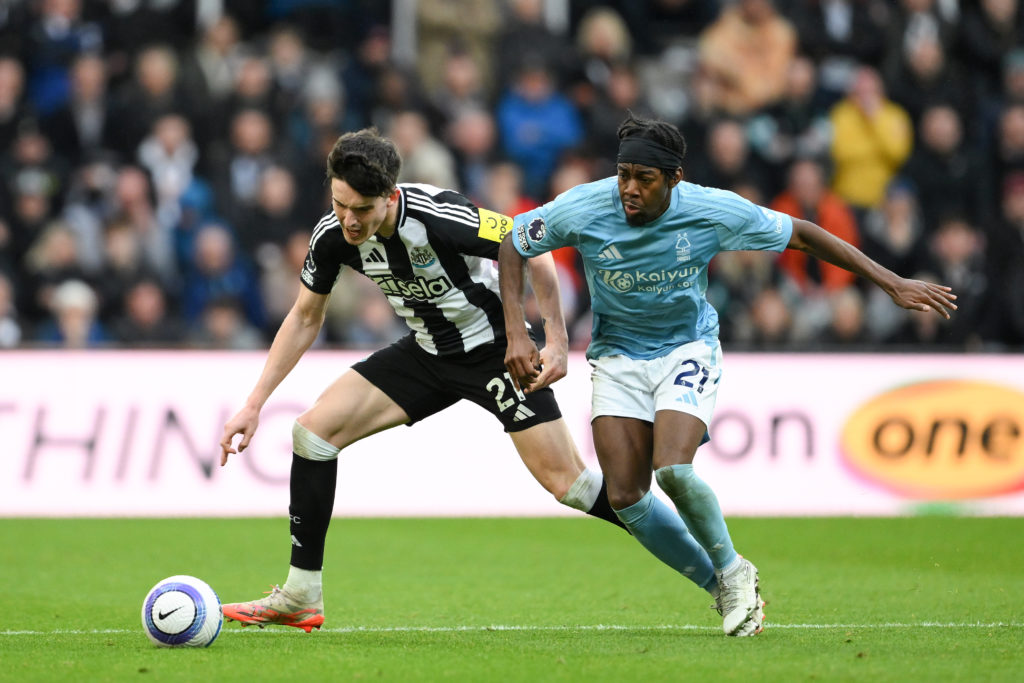 Anthony Elanga and Tino Livramento challenge for the ball during a Premier League game between Newcastle United and Nottingham Forest.