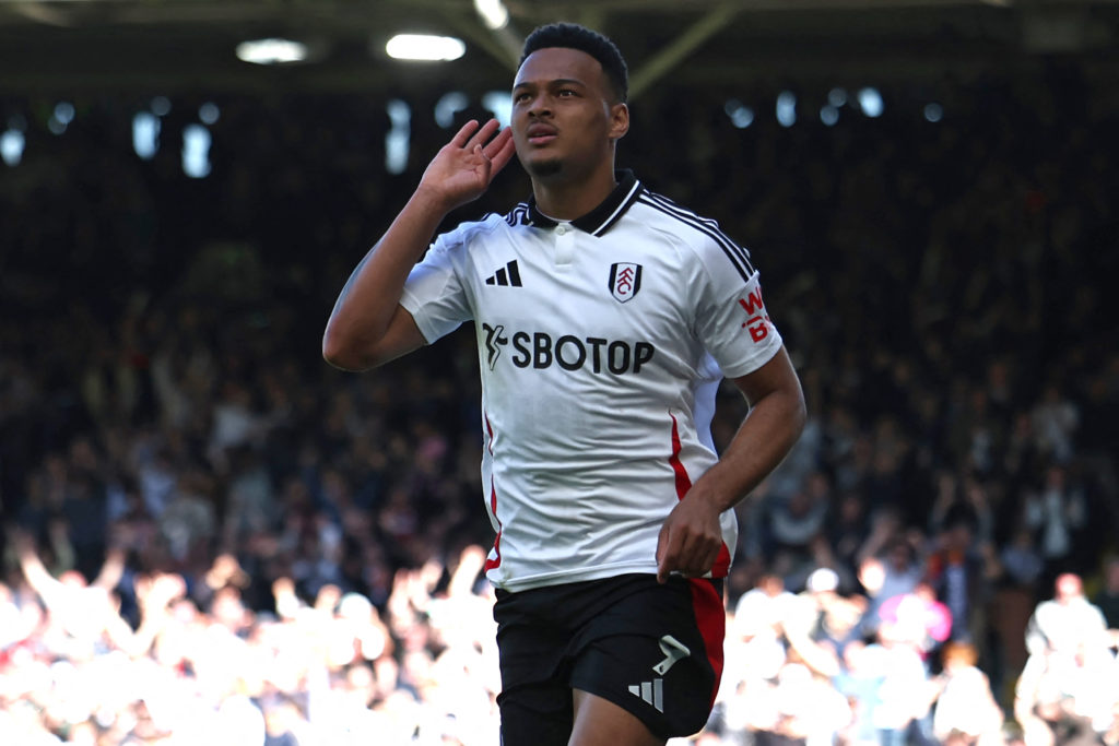 Rodrigo Muniz cups his hand to his ear after scoring a goal for Fulham