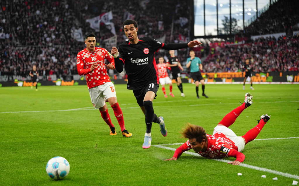 Hugo Ekitike chases the ball during a Bundesliga game for Eintracht Frankfurt.