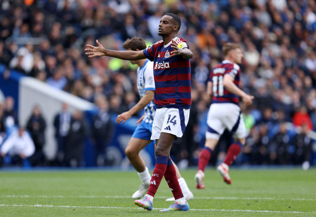 Alexander Isak celebrates after scoring in a Premier League game between Brighton and Newcastle United.