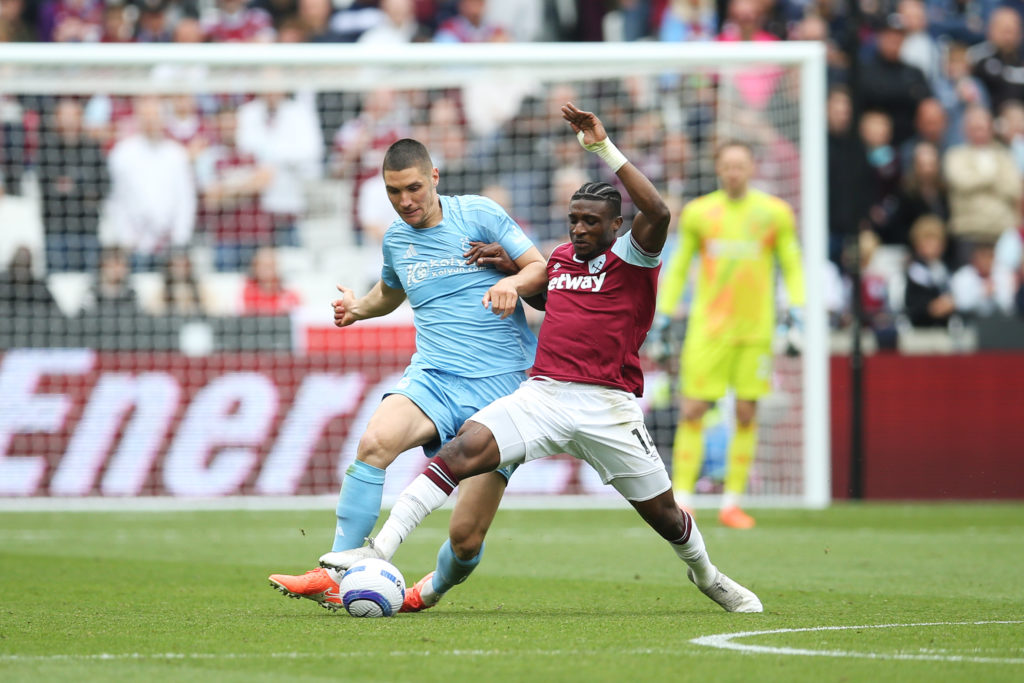 Mohammed Kudus challenges Nikola Milenkovic during West Ham United vs Nottingham Forest in the Premier League.