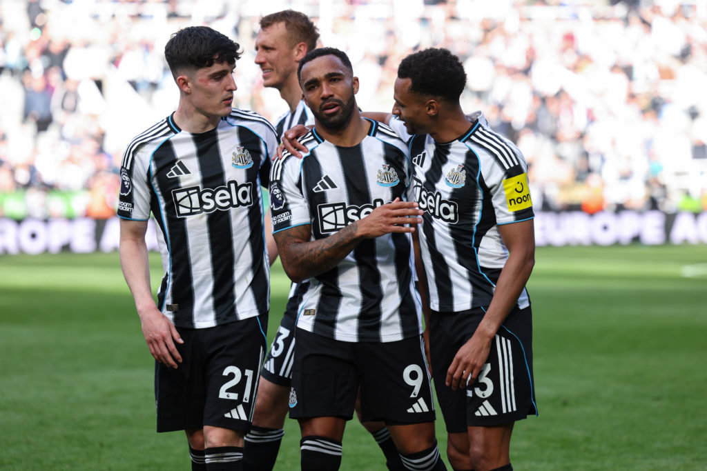 Callum Wilson is consoled by Newcastle United teammates Jacob Murphy and Tino Livramento after the final game of the season versus Everton.