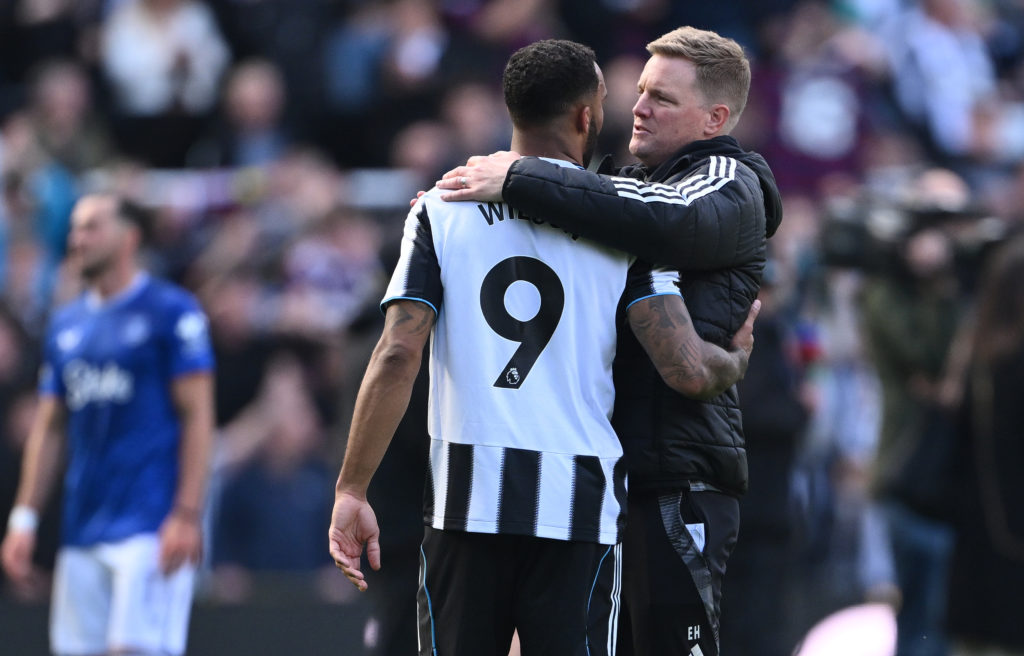 Eddie Howe embraces Callum Wilson after a Premier League game between Newcastle United and Everton.
