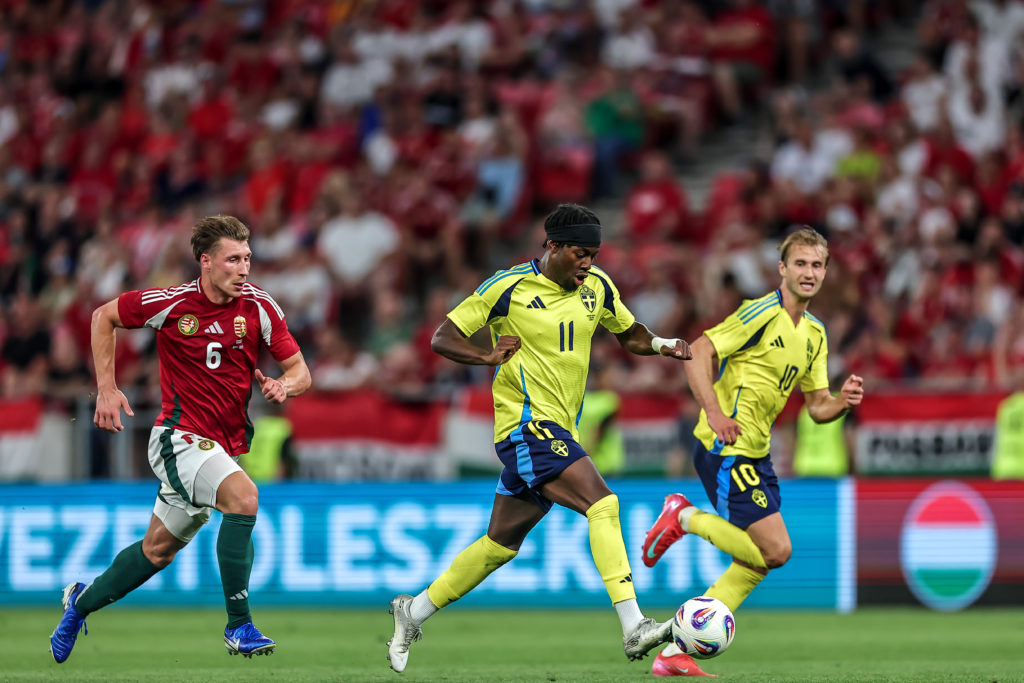 Anthony Elanga runs with the ball during a friendly between Sweden and Hungary.
